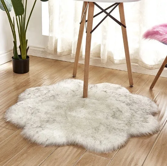 Artificial woolen floral sheepskin hairy plush carpet rug in beige colour, 60x60 cm size, on a tiled floor
