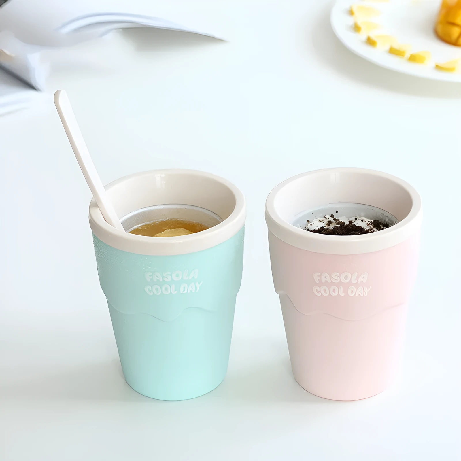 Blue slush ice maker freeze cup on white background, 200ml reusable slush mug for DIY drinks