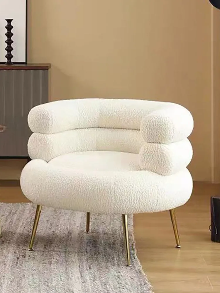 Nordic light luxury hot dog sofa chair in white cloth upholstery with art pattern, suitable for balcony or dressing room