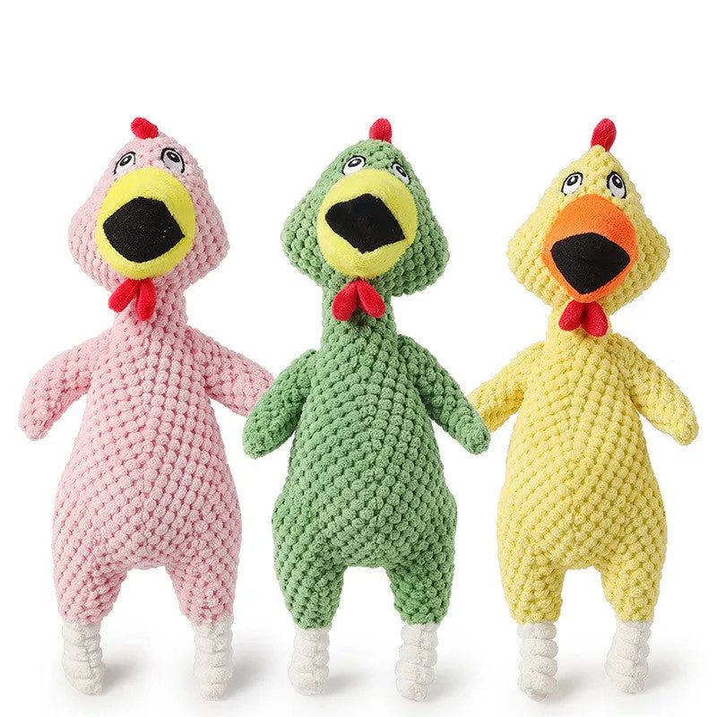 Pink pineapple velvet squeaky pet toy shaped like a chicken, 35cm long, on a white background