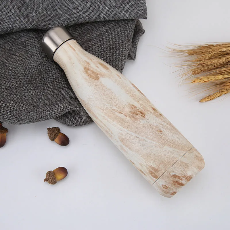 500ml stainless steel vacuum flask with silver finish, double wall insulation, screw cap, suitable for hot and cold drinks