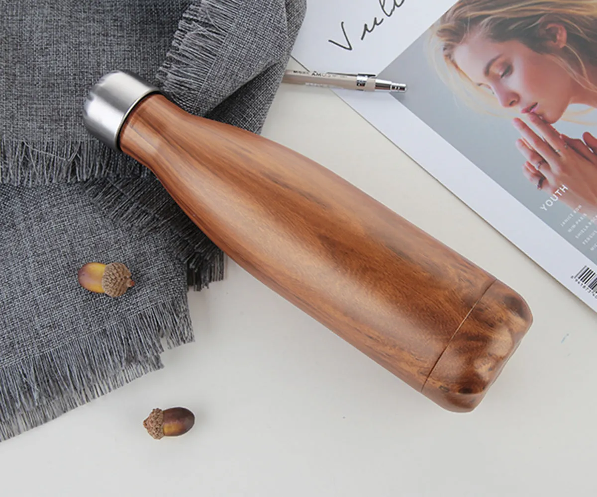 500ml stainless steel vacuum flask with silver finish, double wall insulation, screw cap, suitable for hot and cold drinks