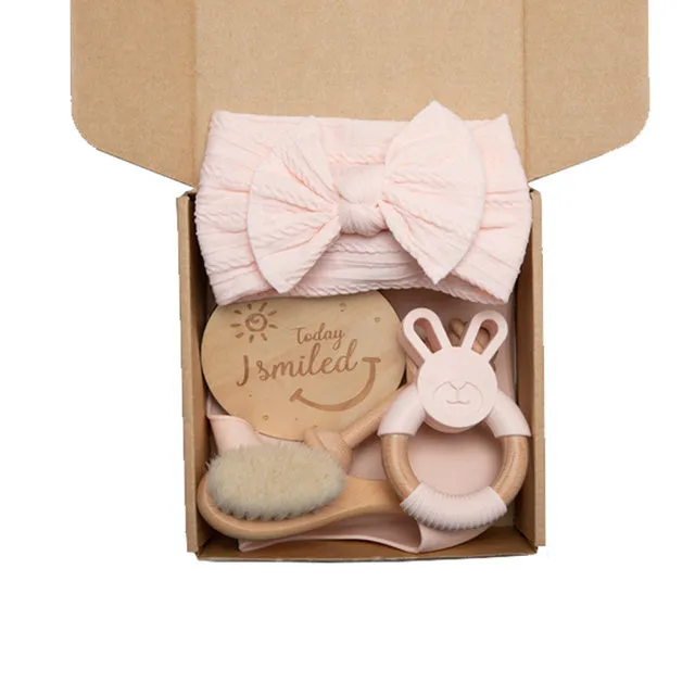 Newborn baby shower toy set in peach colour, six bath toys made from wood and chemical fibre