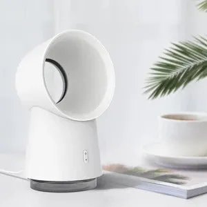 White desktop bladeless fan with USB power and humidification spray on a desk