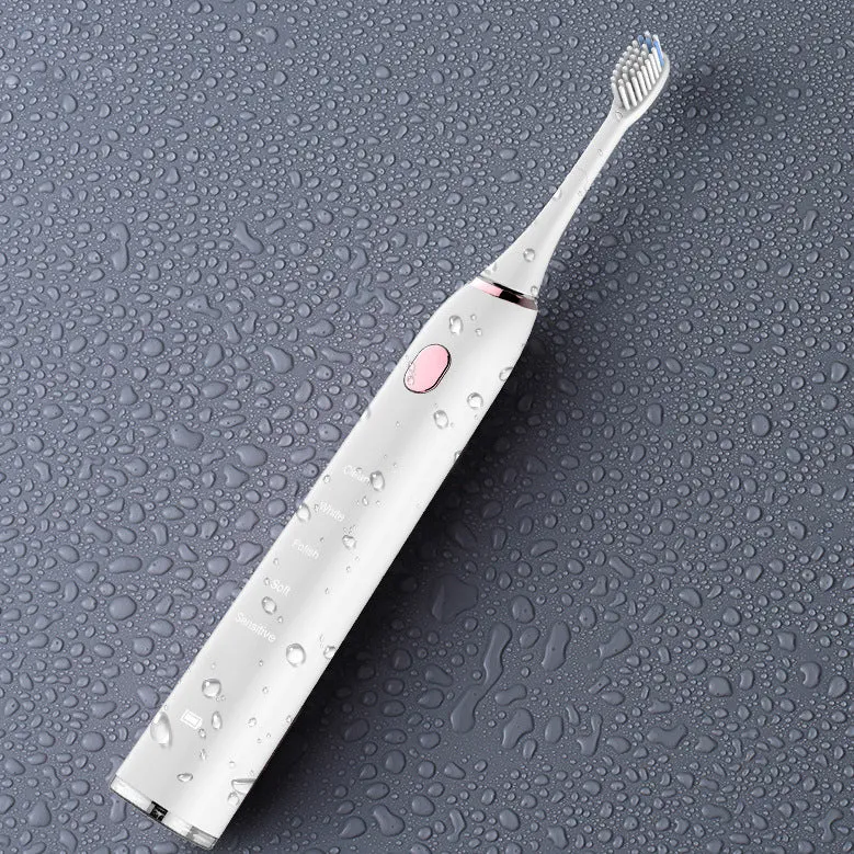 White waterproof electric toothbrush with inductive charging base and five nursing mode buttons