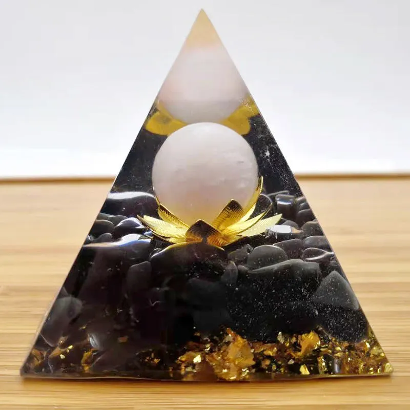 Black resin pyramid ornament 60x60mm on a white surface with white square paper box packaging