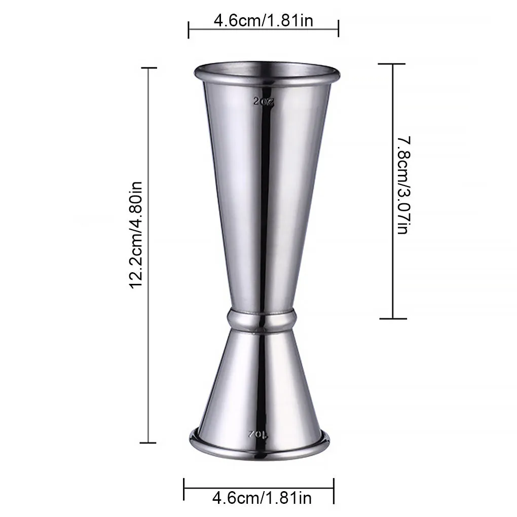 Double-headed stainless steel measuring cup and shaker on a bar counter for cocktail preparation
