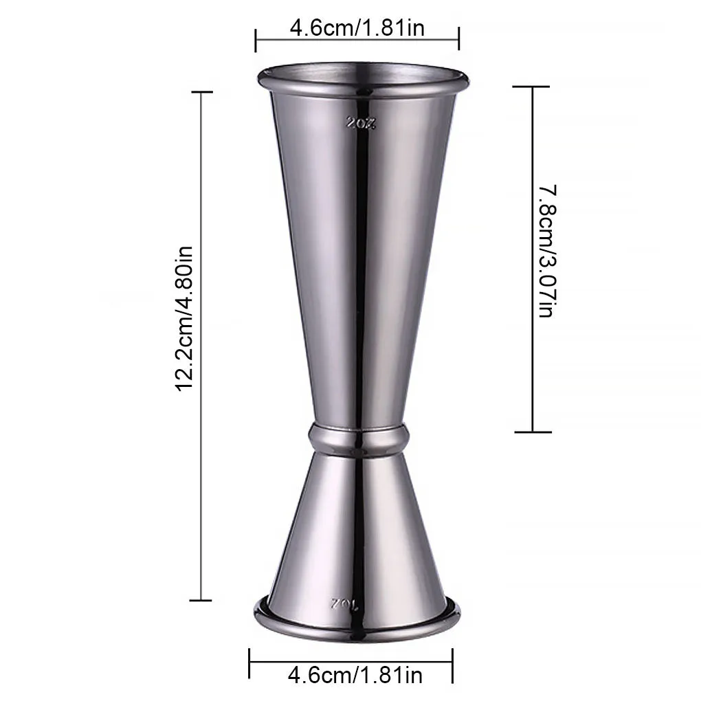 Double-headed stainless steel measuring cup and shaker on a bar counter for cocktail preparation