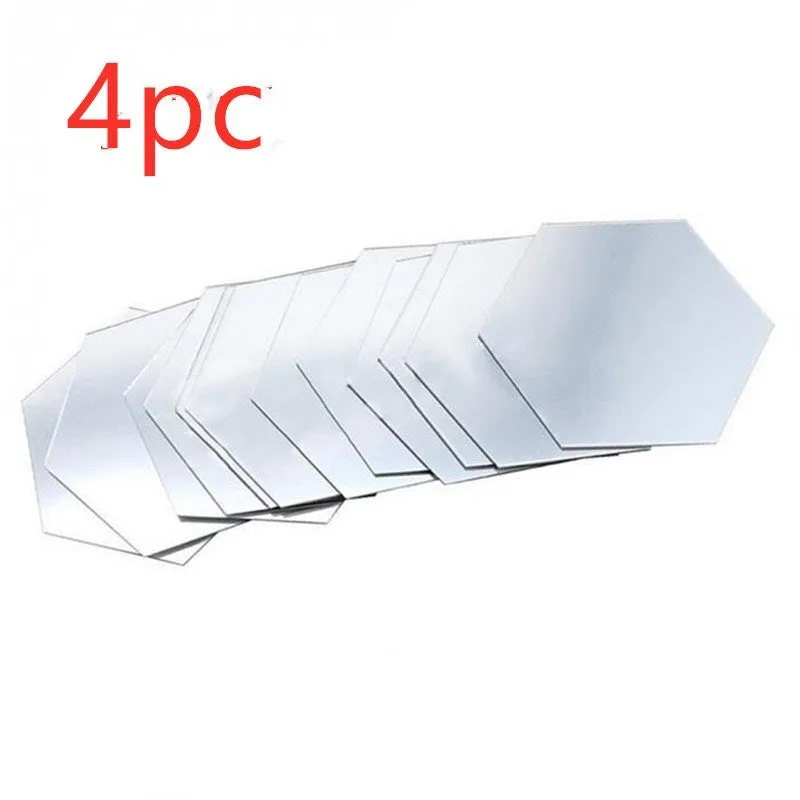 Hexagonal silver PS mirror wall sticker on a wall surface close up