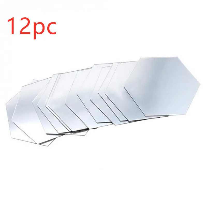 Hexagonal silver PS mirror wall sticker on a wall surface close up