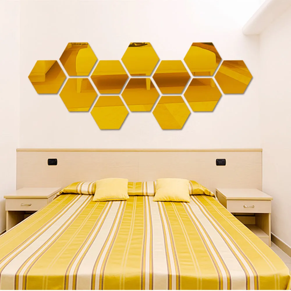 Hexagonal silver PS mirror wall sticker on a wall surface close up