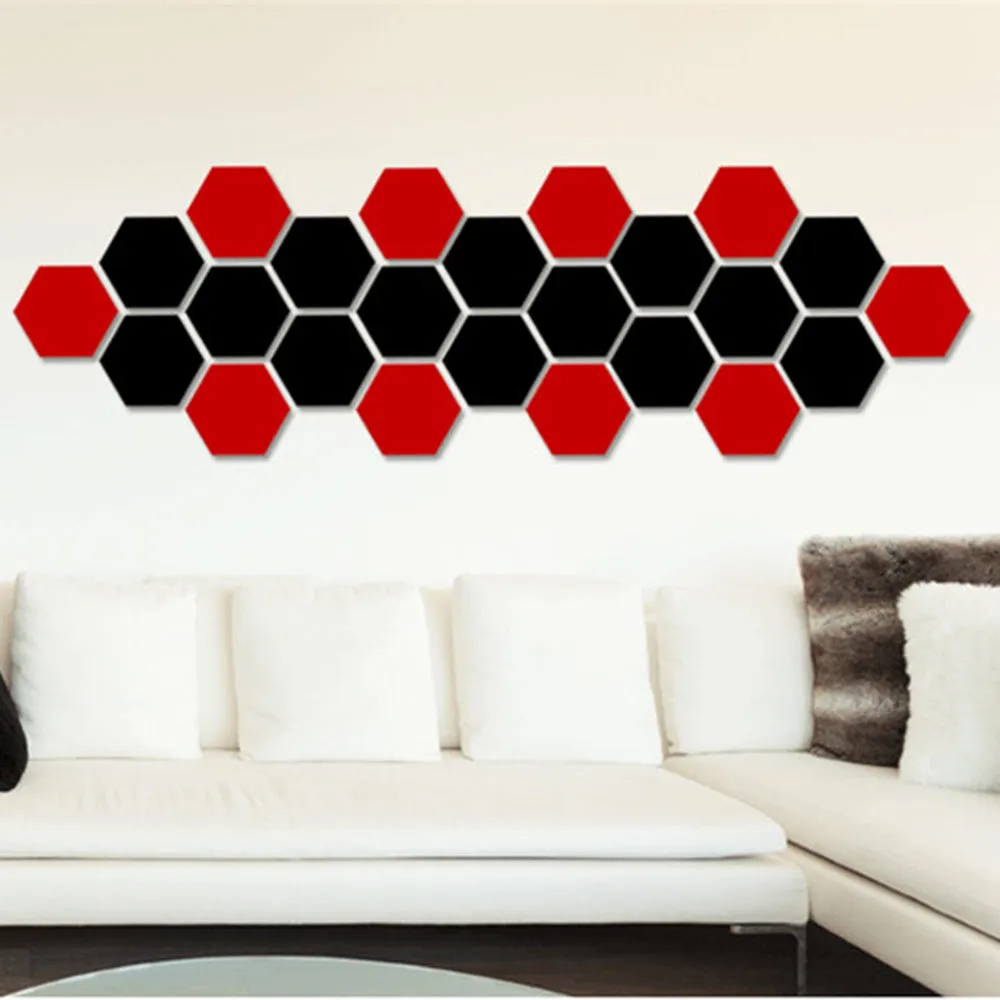 Hexagonal silver PS mirror wall sticker on a wall surface close up