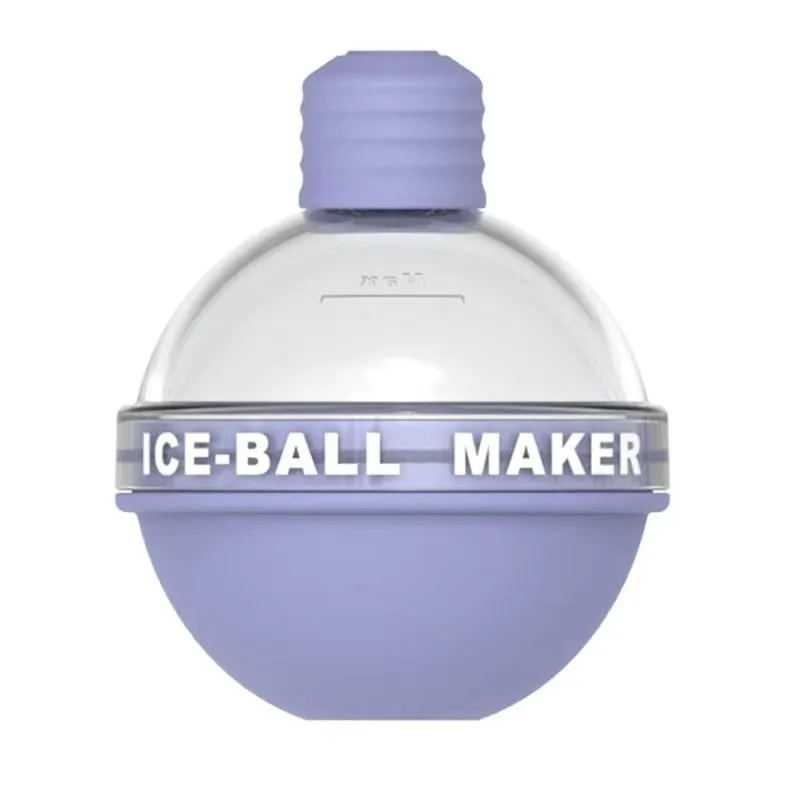 Blue spherical silicone ice ball mold producing a 6cm clear ice ball for whiskey, on a wooden table