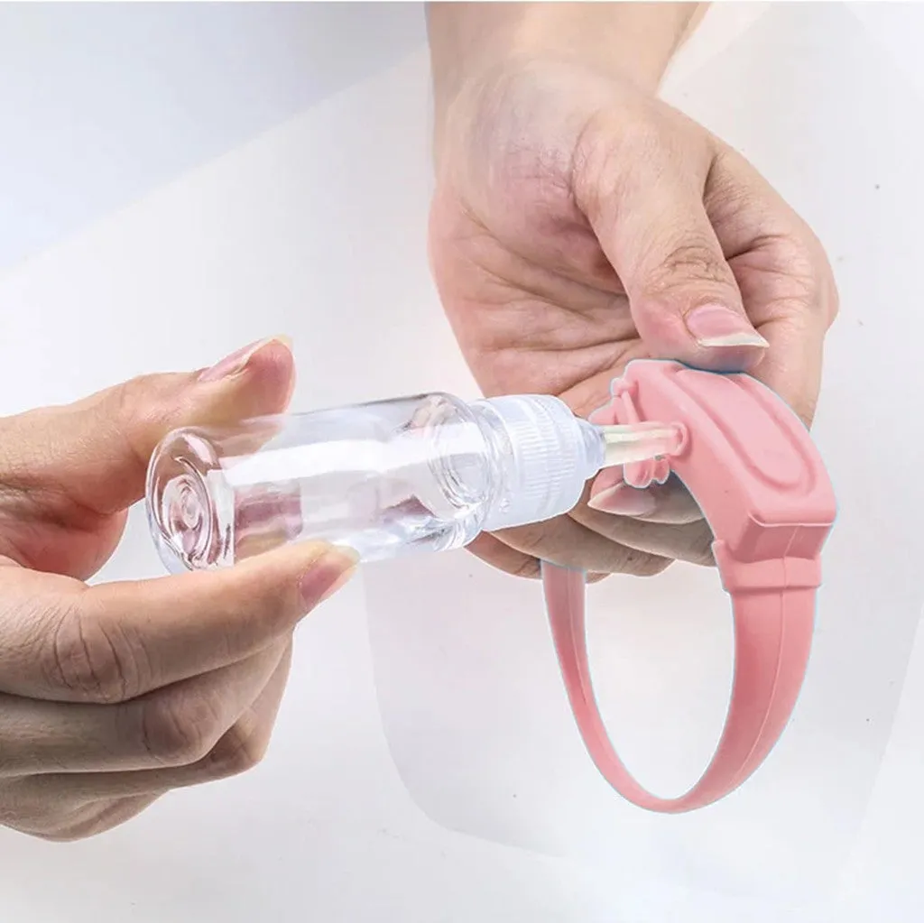 Portable hand sanitizer dispenser silicone wristband with refill cap, black band holding 6mL bottle