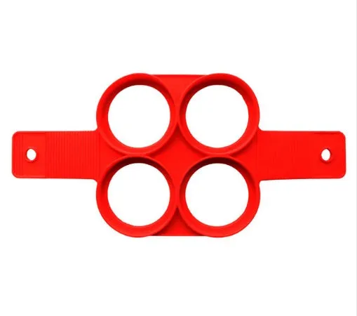 Red silicone egg mould set with heart, lace, round, square and 7-hole shapes on a white background