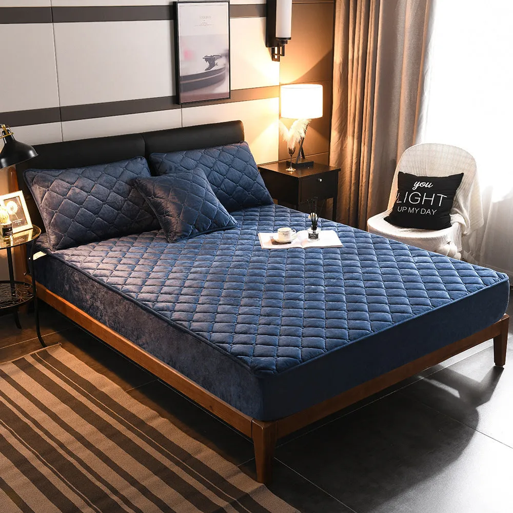 Crystal fleece padded bed cover in grey with quilted stitching and matching pillow case
