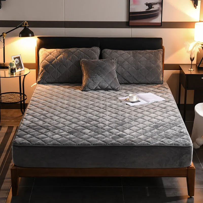Crystal fleece padded bed cover in grey with quilted stitching and matching pillow case