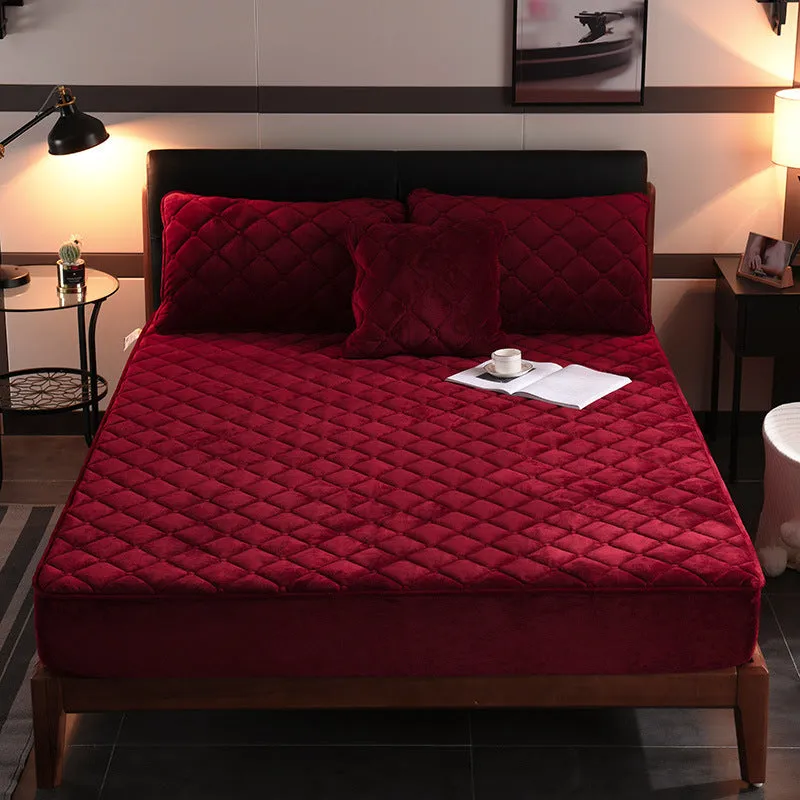 Crystal fleece padded bed cover in grey with quilted stitching and matching pillow case