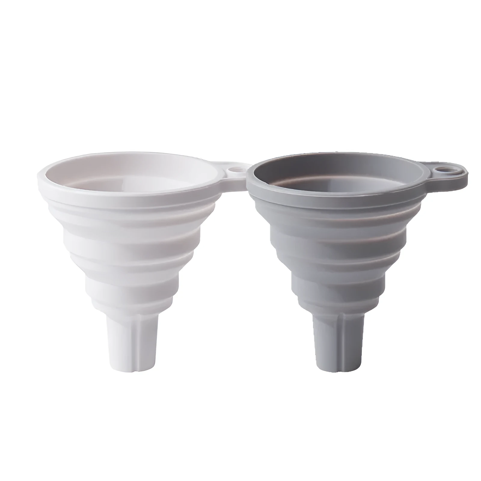 Creative silicone folding funnel in grey and white, collapsed flat on a kitchen surface