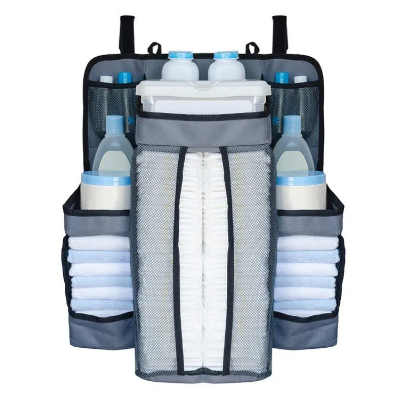 Gray baby diaper organizer hanging on crib with adjustable Velcro straps, TC Oxford cloth construction