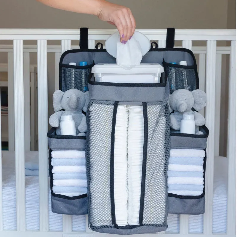 Gray baby diaper organizer hanging on crib with adjustable Velcro straps, TC Oxford cloth construction