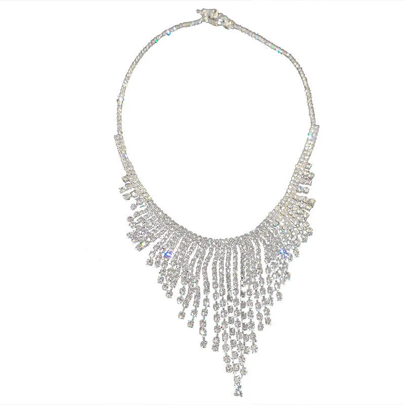 Silver alloy diamond tassel necklace with geometric pendant and ball bead chain on a white background