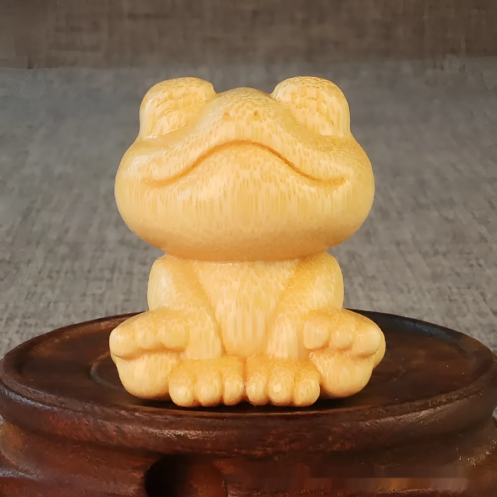 Solid bamboo carved smiling frog ornament with cartoon cute style, measuring 5cm high.