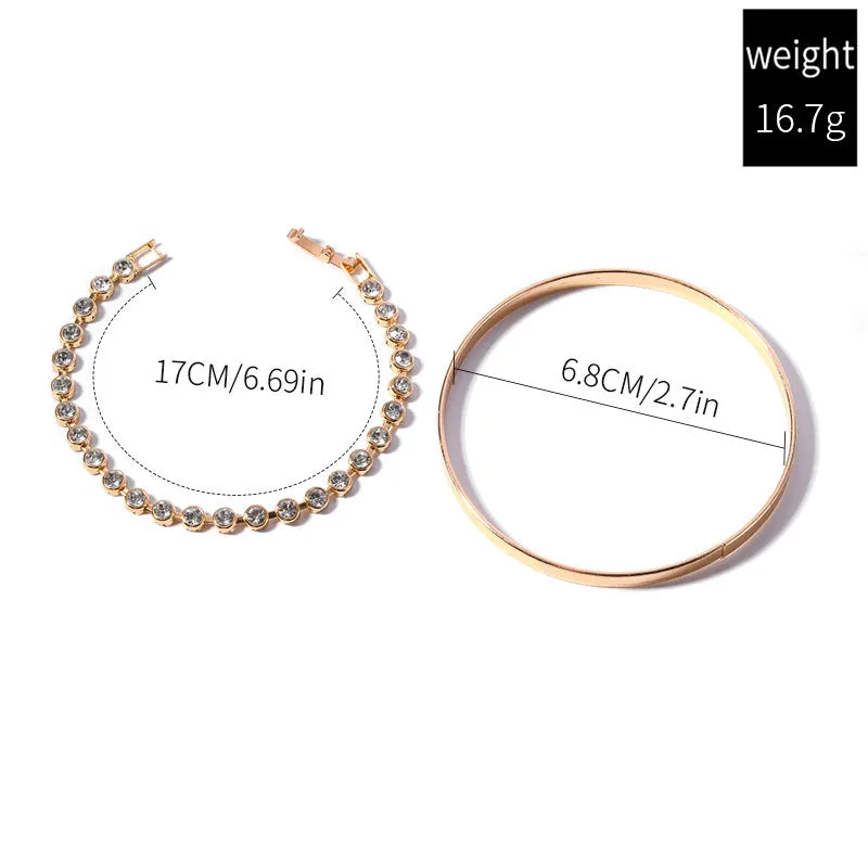 Two vintage drop-shaped geometric bracelets in gold and silver, side by side