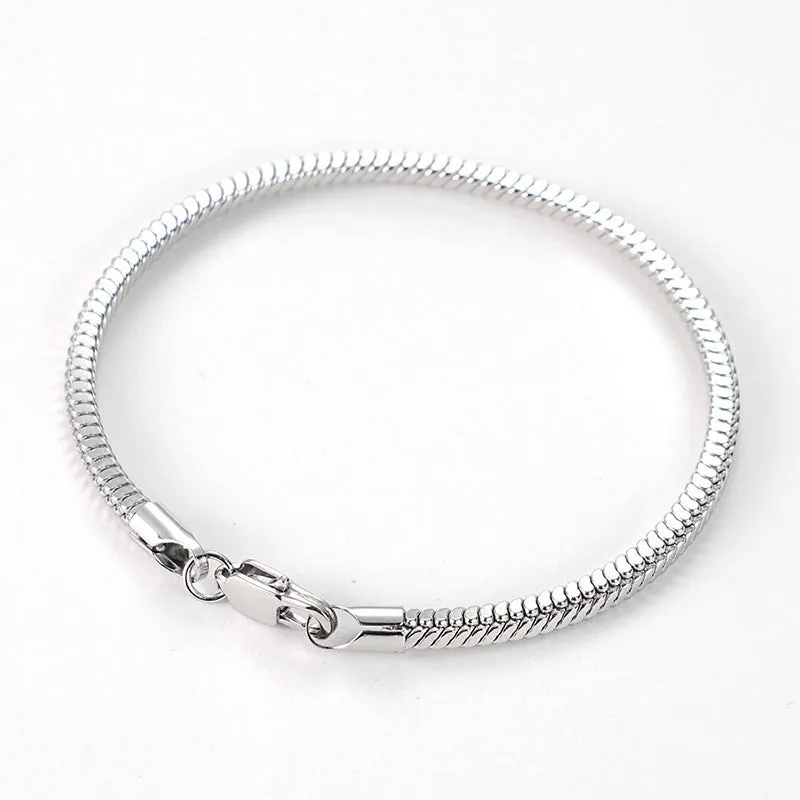 Stainless steel snake chain bracelet in silver tone, geometric line design with electroplated finish