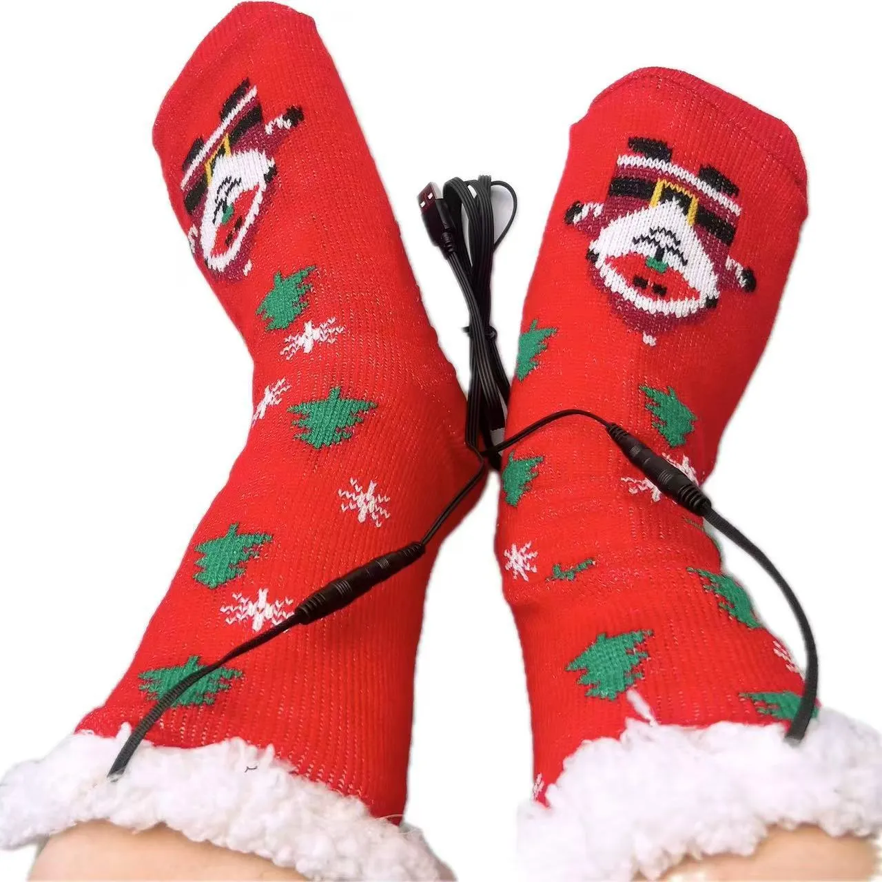 USB electric heating thickened room socks in red Santa Claus jacquard pattern on a white background