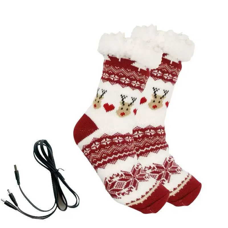 USB electric heating thickened room socks in red Santa Claus jacquard pattern on a white background