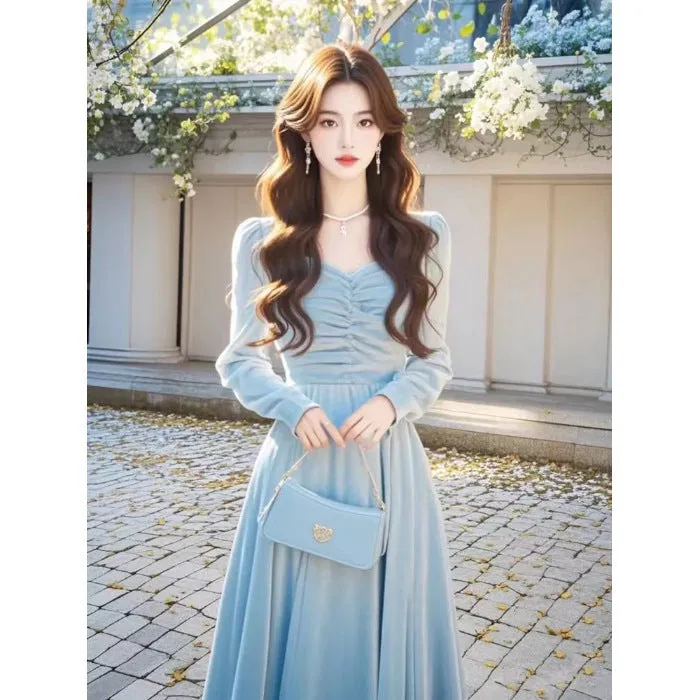 Solid colour fairy dress with mid-waist long sleeves in blue, shown on model