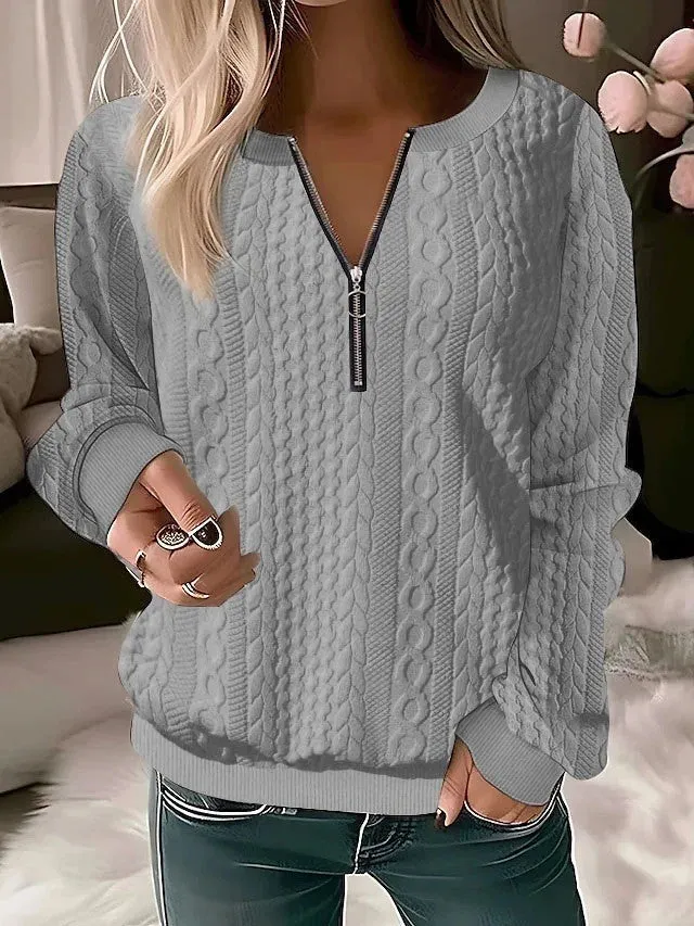 Women's zipper cardigan in apricot with 3D effect pattern, loose fit, and front zipper closure