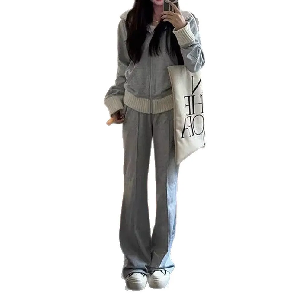 Women's light gray polyester two-piece set consisting of a pocket coat and wide leg trousers, shown flat lay view.