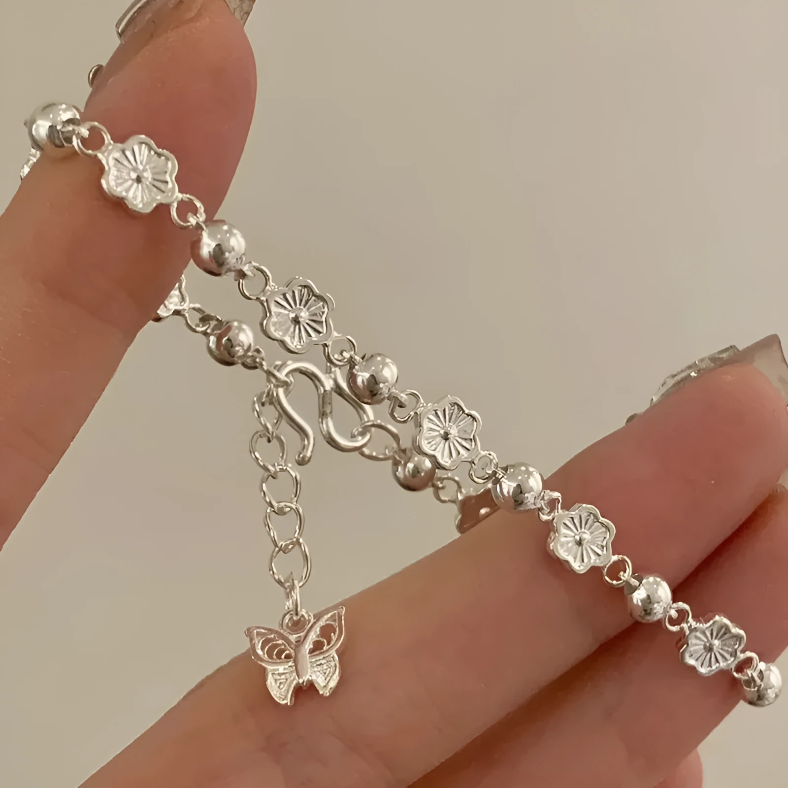 Peach blossom butterfly alloy bracelet with peach heart chain and geometric rose design