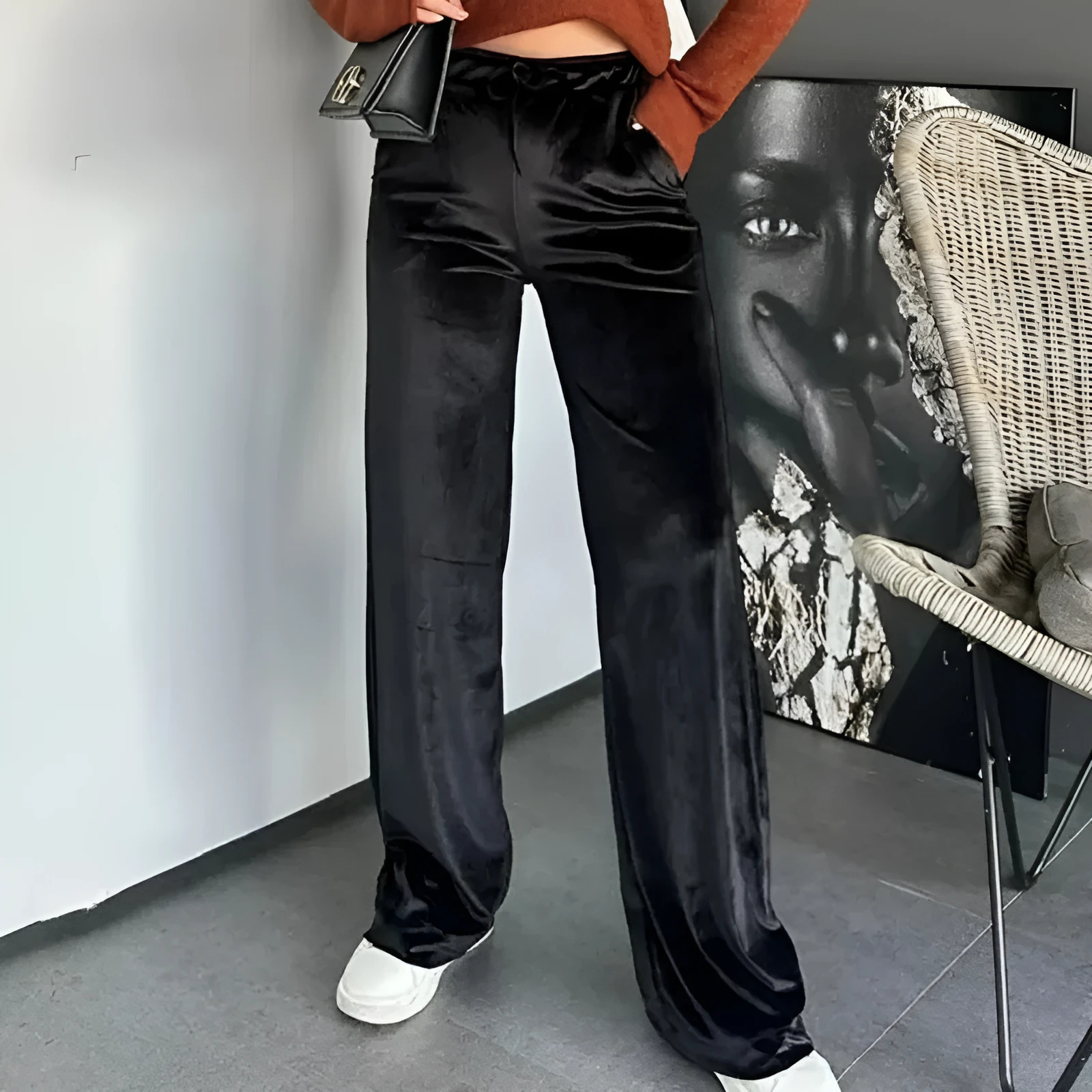 Black shiny velvet high waist drawstring straight leg casual pants on model showing full length