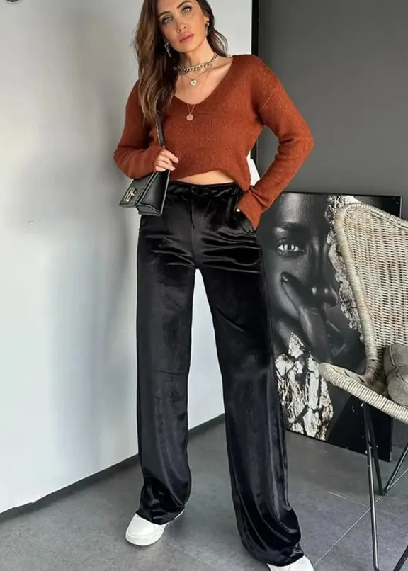 Black shiny velvet high waist drawstring straight leg casual pants on model showing full length
