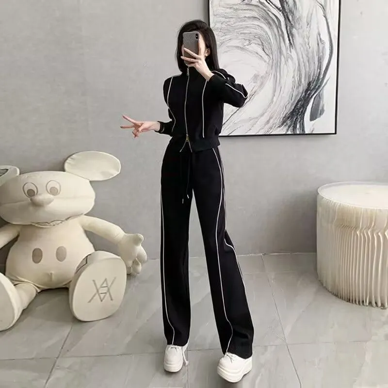 Women's casual two-piece set in white with short zipper sweater and wide leg trousers, polyester fabric, collage stitching