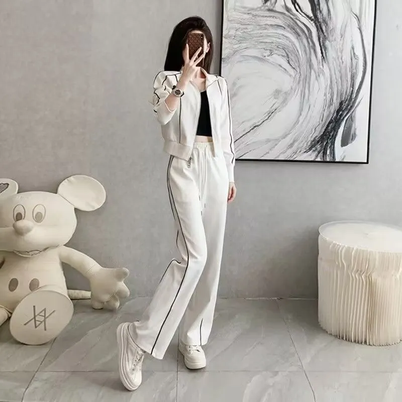 Women's casual two-piece set in white with short zipper sweater and wide leg trousers, polyester fabric, collage stitching