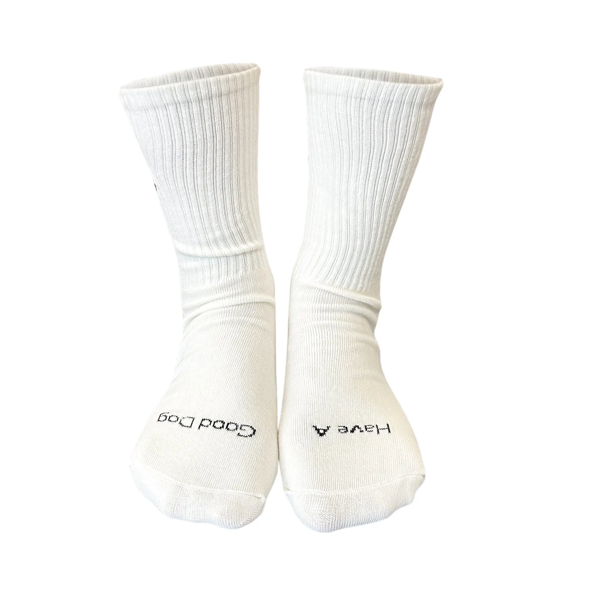 White cotton tube socks with printed Corgi dog pattern on a white background