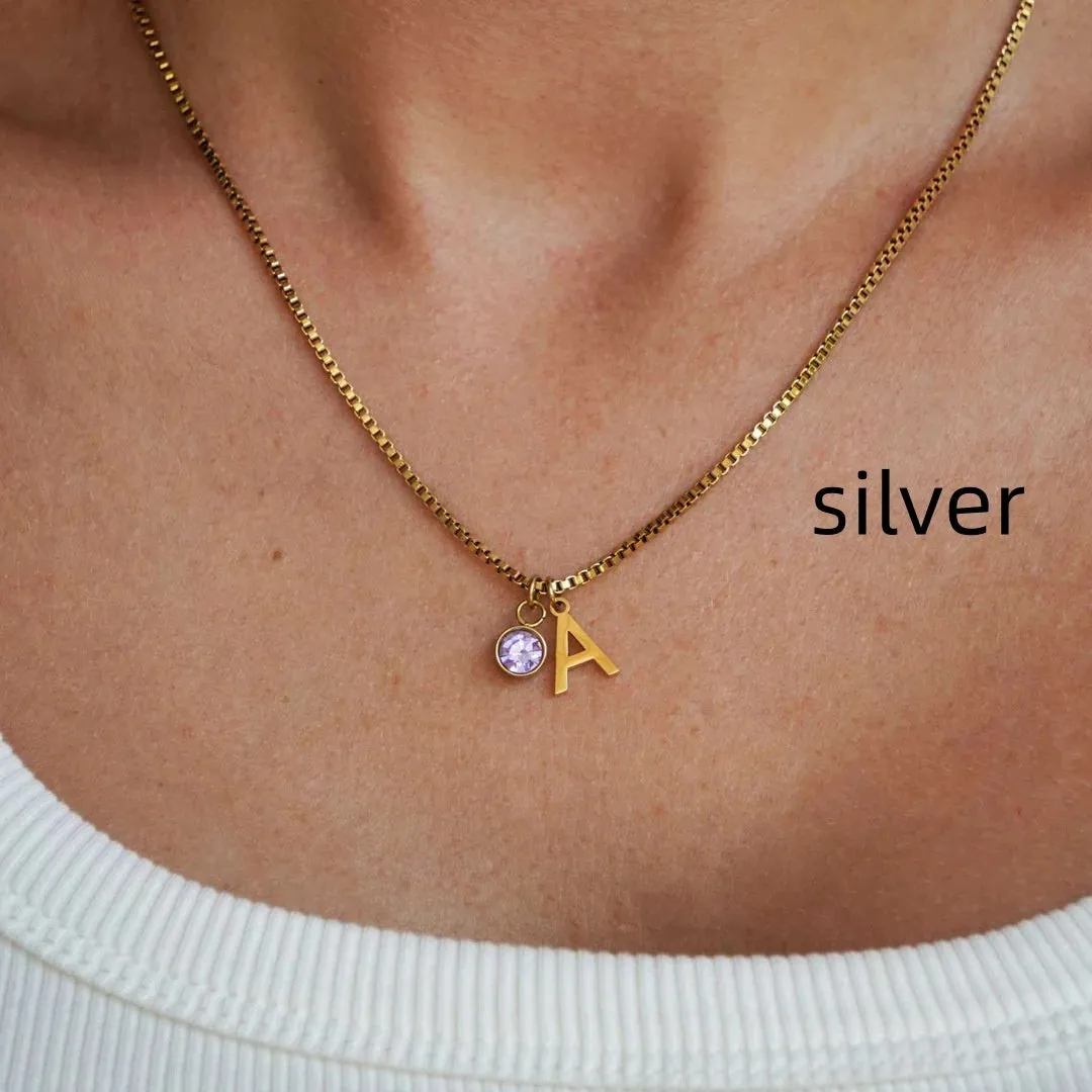 Gold and silver stainless steel birthstone first letter necklace with O-ring chain and personalised pendant
