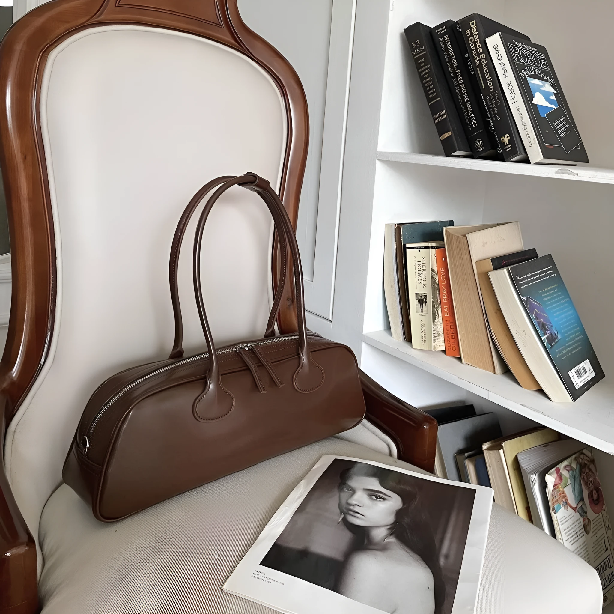 Women's genuine leather first layer cowhide oval single-shoulder bag in Brownie Brown colour with sewing thread detailing