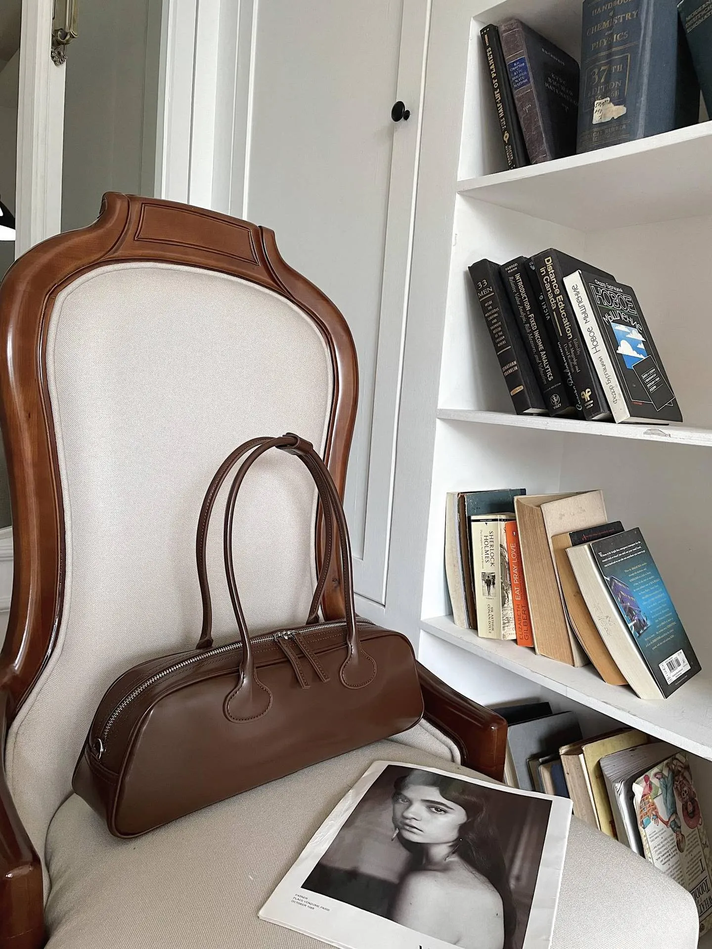 Women's genuine leather first layer cowhide oval single-shoulder bag in Brownie Brown colour with sewing thread detailing