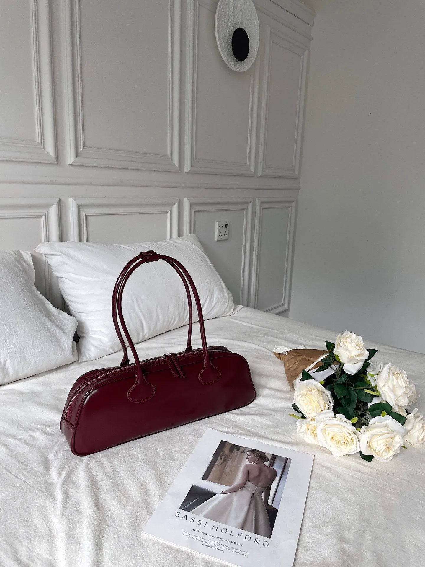 Women's genuine leather first layer cowhide oval single-shoulder bag in Brownie Brown colour with sewing thread detailing