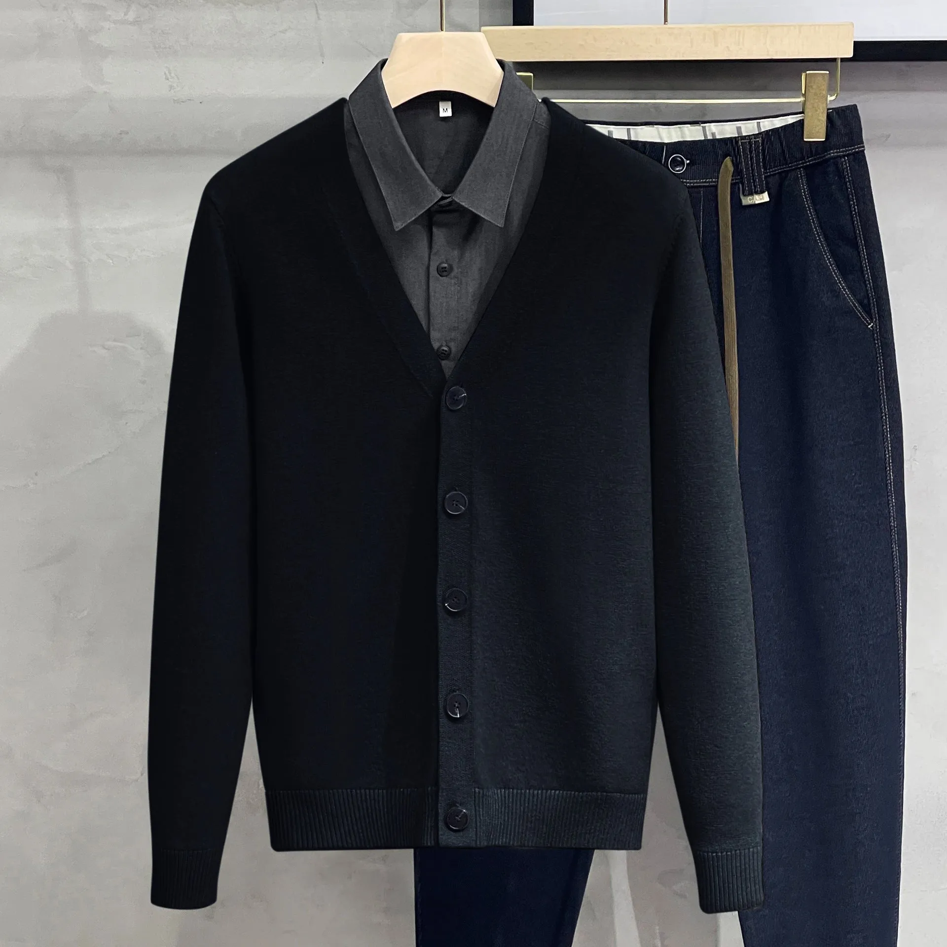 Men's cotton knitted cardigan sweater coat in black, V-neck, long sleeves, loose fit, winter casual wear.