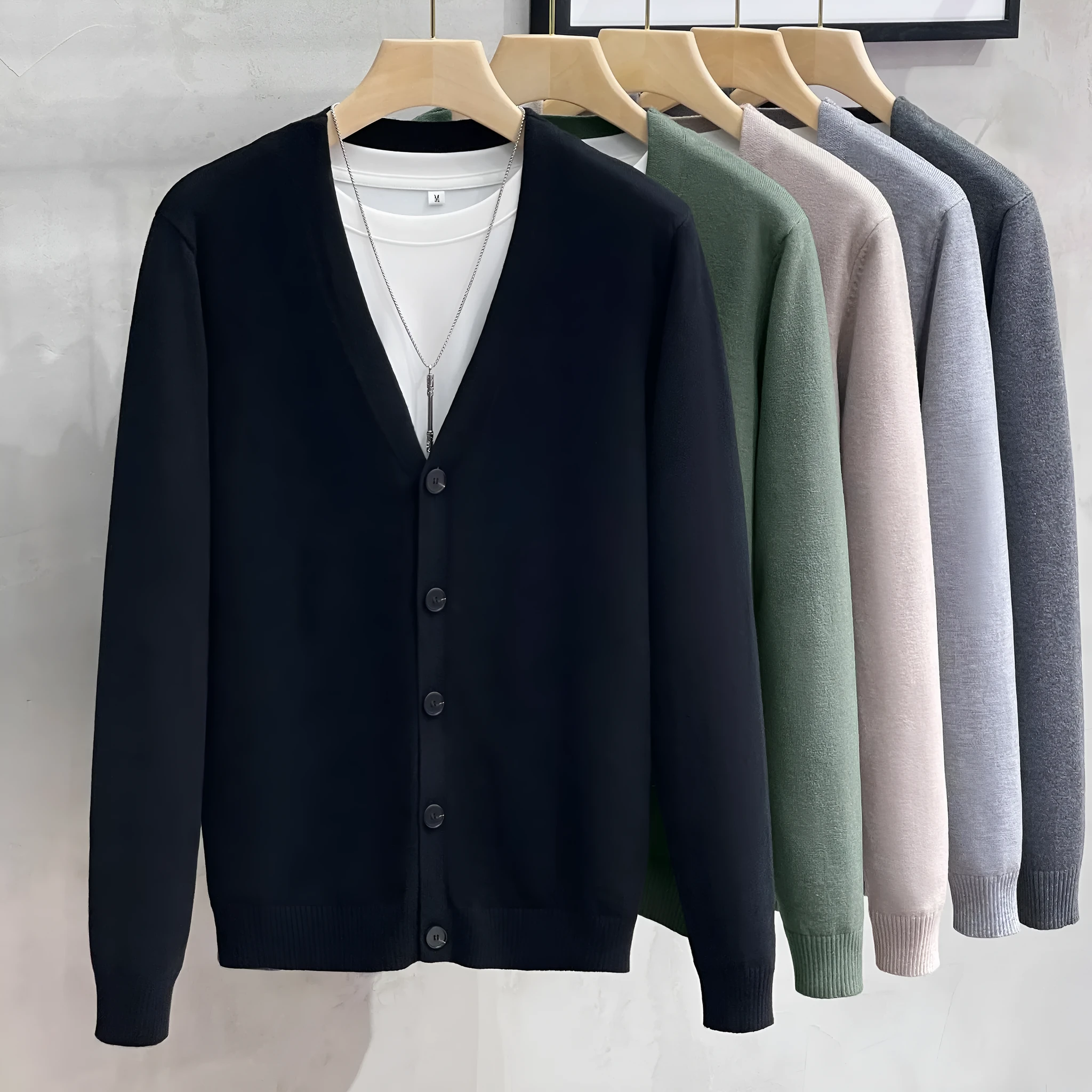 Men's cotton knitted cardigan sweater coat in black, V-neck, long sleeves, loose fit, winter casual wear.