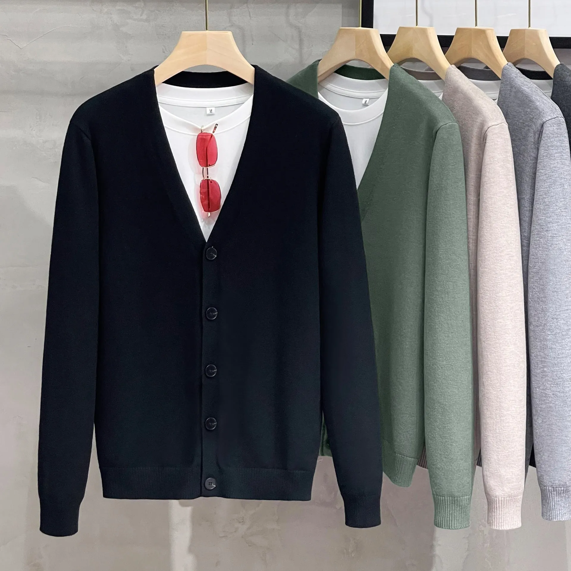 Men's cotton knitted cardigan sweater coat in black, V-neck, long sleeves, loose fit, winter casual wear.