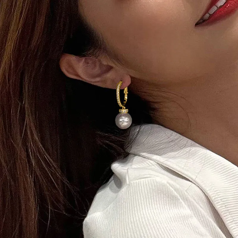 Yellow gold copper earrings with imitation pearl and inlaid zircon in geometric round shape