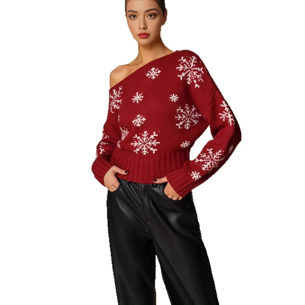 Women's red snowflake jacquard boat neck pullover sweater with long sleeves and crocheted flower details on a white background