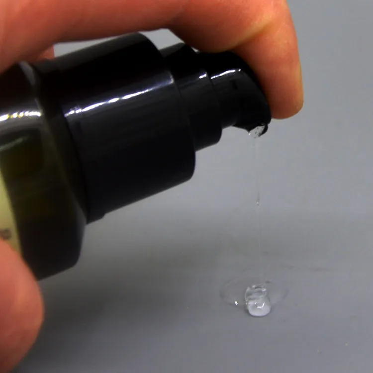 Leave-in hair oil product photo; smooth shiny frizz-resistant treatment for damaged dyed permed hair